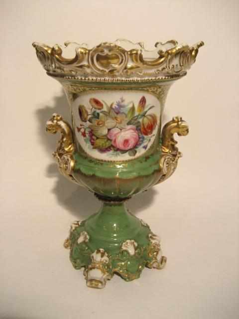 Appraisal: An English porcelain two handled urn height in diameter in