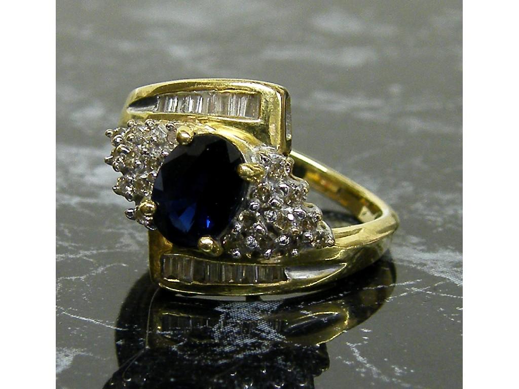 Appraisal: Fancy ct sapphire and diamond cluster ring the oval centre