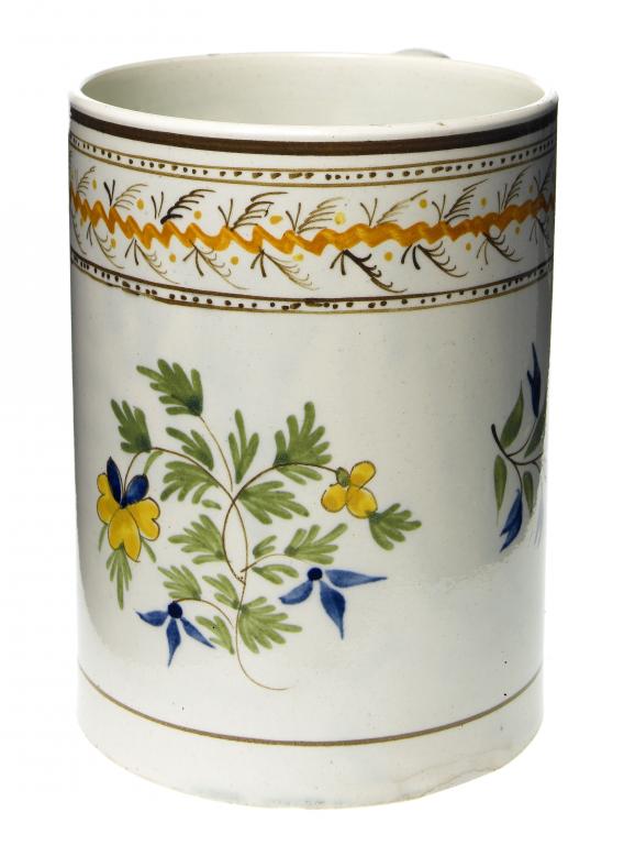 Appraisal: A PEARLWARE CYLINDRICAL MUG painted in the Pratt palette with