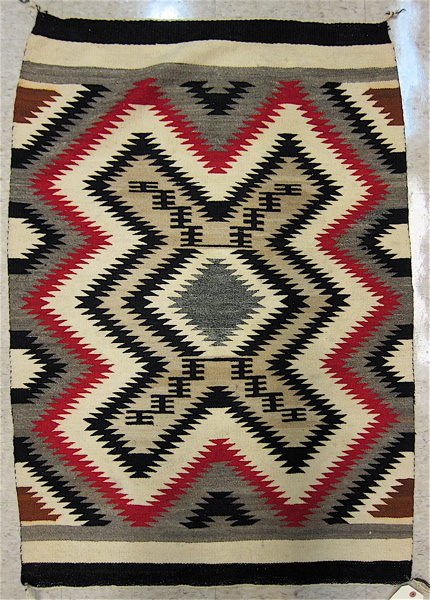 Appraisal: HAND WOVEN NAVAJO AREA RUG lightning bolt pattern ' x