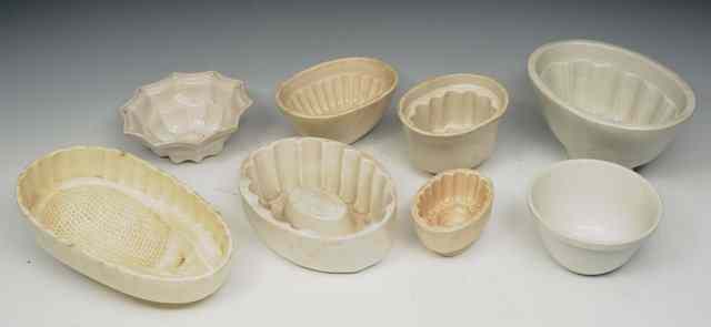 Appraisal: A GROUP OF OLD POTTERY JELLY MOULDS to include one