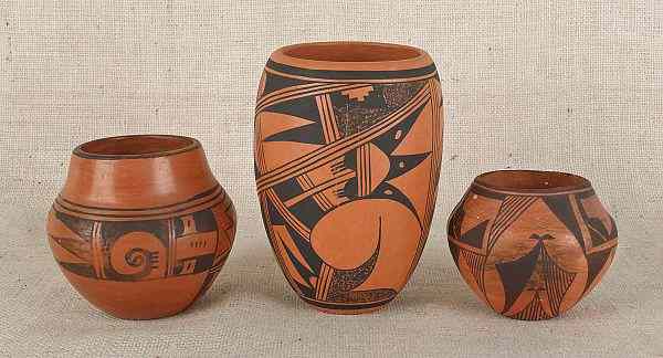 Appraisal: Three Southwest pottery jars the tallest signed Evelyn Pooehico tallest