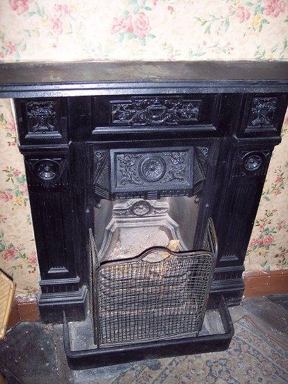 Appraisal: A Victorian cast iron fire surround cm wide a low