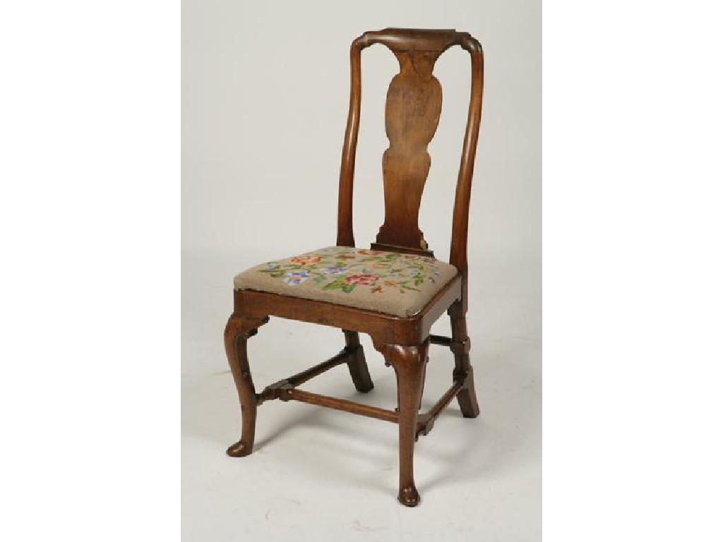 Appraisal: A GEORGE I WALNUT DINING CHAIR the vase-shaped back splat