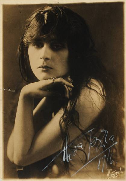 Appraisal: A Theda Bara signed sepia photograph A vintage print with