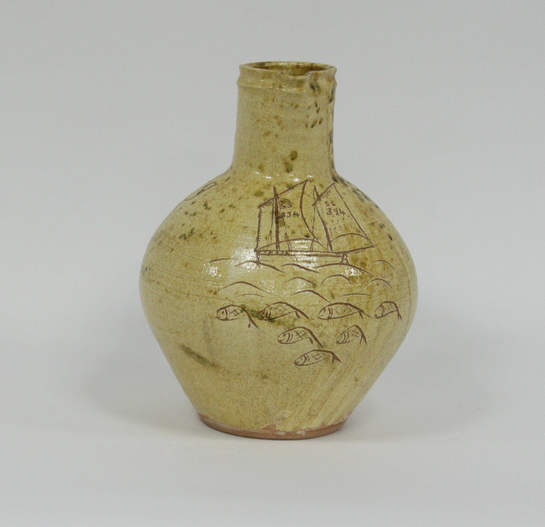 Appraisal: William Marshall St Ives A slipware and sgraffito jug dated