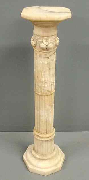 Appraisal: Carved alabaster pedestal late th c with a cut-corner rotating