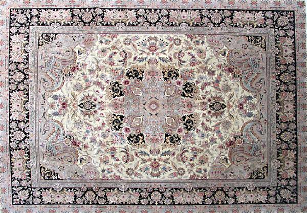 Appraisal: A Kashan design carpet size approximately ft x ft