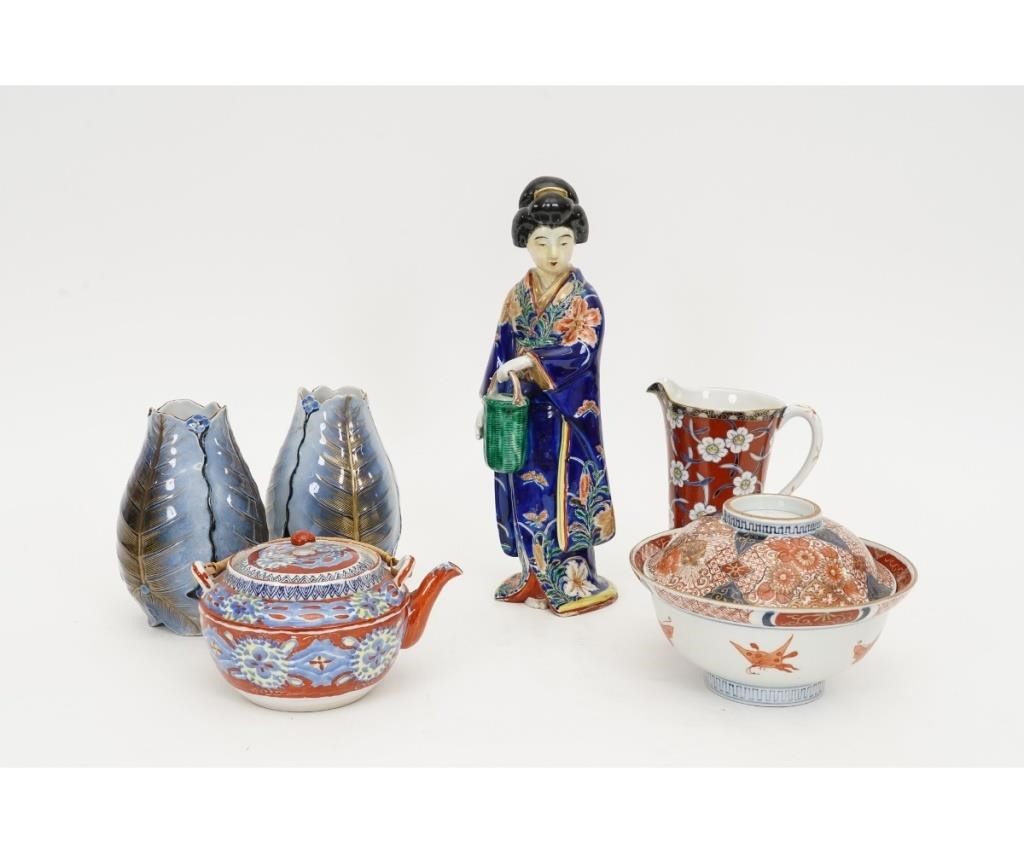 Appraisal: Japanese porcelain figure h together with a covered Imari bowl