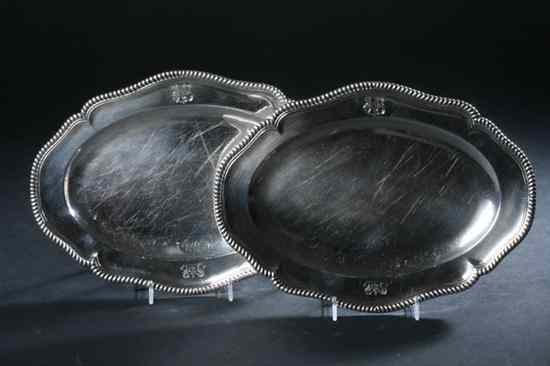 Appraisal: PAIR GEORGE II SILVER MEAT PLATTERS Paul Crespin London Shaped