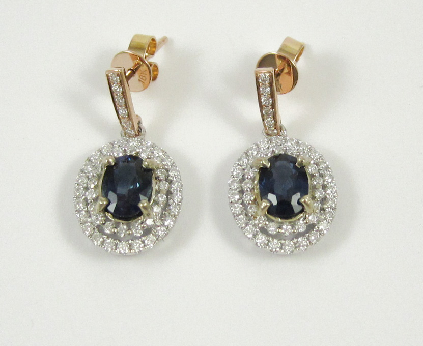 Appraisal: PAIR OF SAPPHIRE AND EIGHTEEN KARAT GOLD EARRINGS Each k