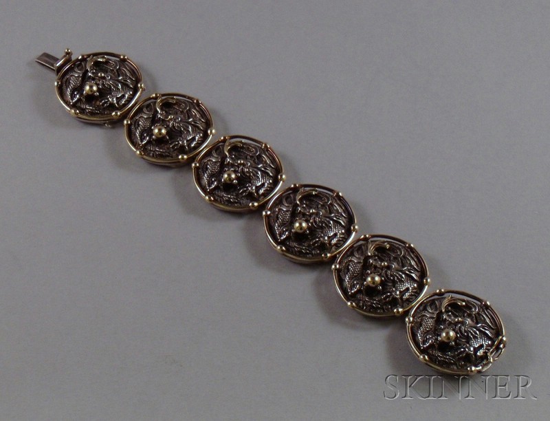 Appraisal: kt Gold and Sterling Silver Panel Bracelet depicting a dragon