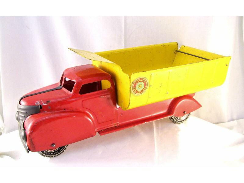 Appraisal: Marx Lumar Contractors Dump Truck Nice red and yellow painted