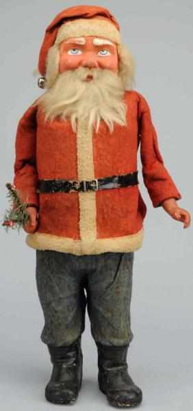 Appraisal: Large Santa Holding Fir Tree Paper mache face composition hands