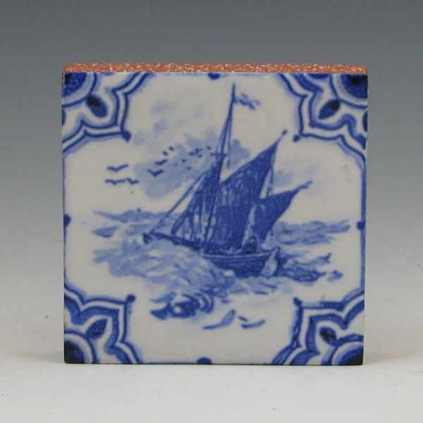 Appraisal: Mosaic Tile Co ship tile in blue on white Marked