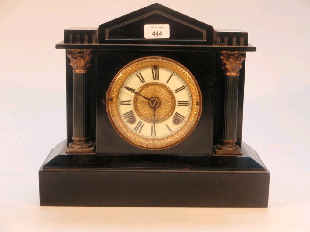 Appraisal: A Victorian eight-day mantel clock in metal architectural slate effect