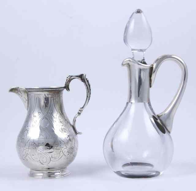 Appraisal: A Victorian engraved silver cream jug London hallmarks date letter