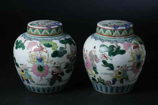 Appraisal: PAIR CHINESE FAMILLE ROSE PORCELAIN JARS AND COVERS Figural decoration