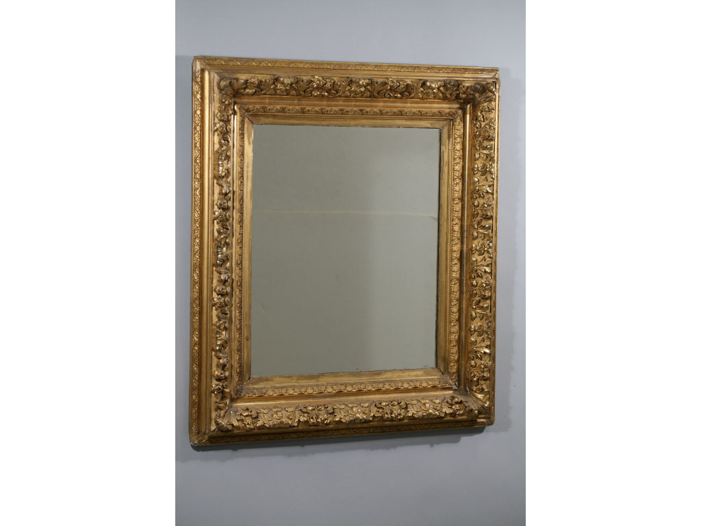 Appraisal: Ornate Gilt Composition Frame with Mirror th c deep frame