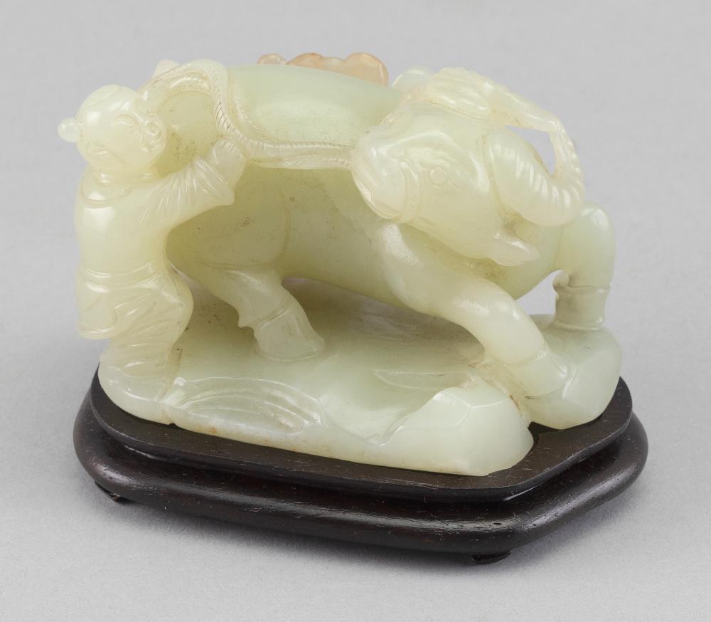 Appraisal: CHINESE CARVED CELADON JADE FIGURE OF A HERD BOY AND