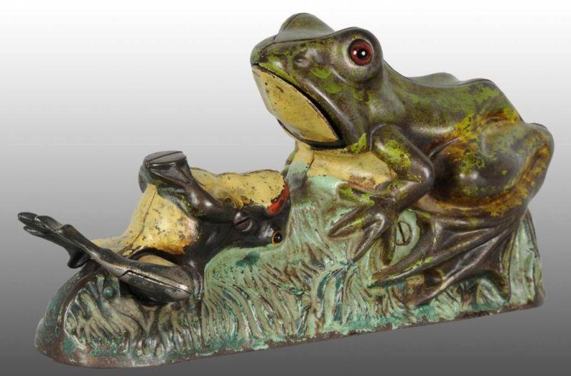 Appraisal: Cast Iron Frogs Mechanical Bank Description Manufactured by J E