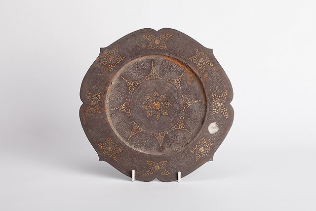 Appraisal: AN INDIAN GOLD AND SILVER INLAID METAL DISH in the