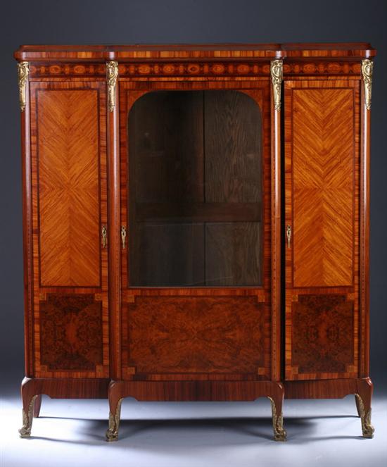 Appraisal: LOUIS XVI STYLE MIXED-WOOD INLAID BIBLIOTHEQUE th century with gilt-metal