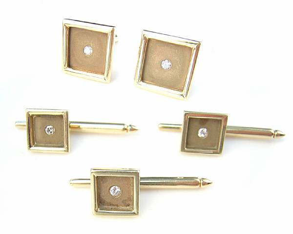 Appraisal: A pair of diamond and fourteen karat yellow gold cufflinks