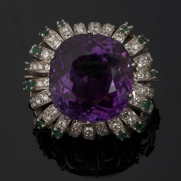 Appraisal: An amethyst diamond and emerald clip-brooch amethyst measuring approximately x