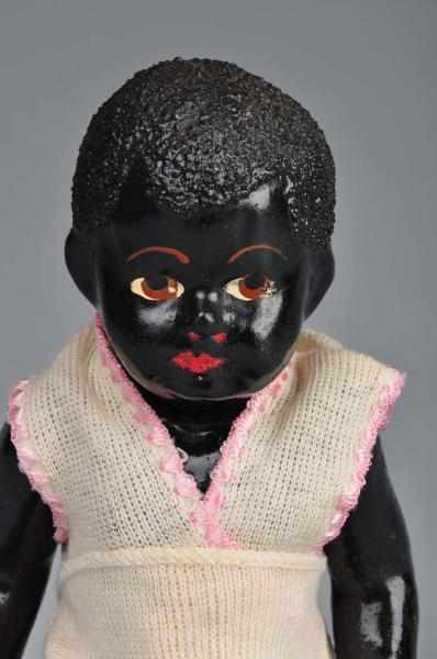 Appraisal: Black German Composition Baby Description Unmarked molded hair nicely painted