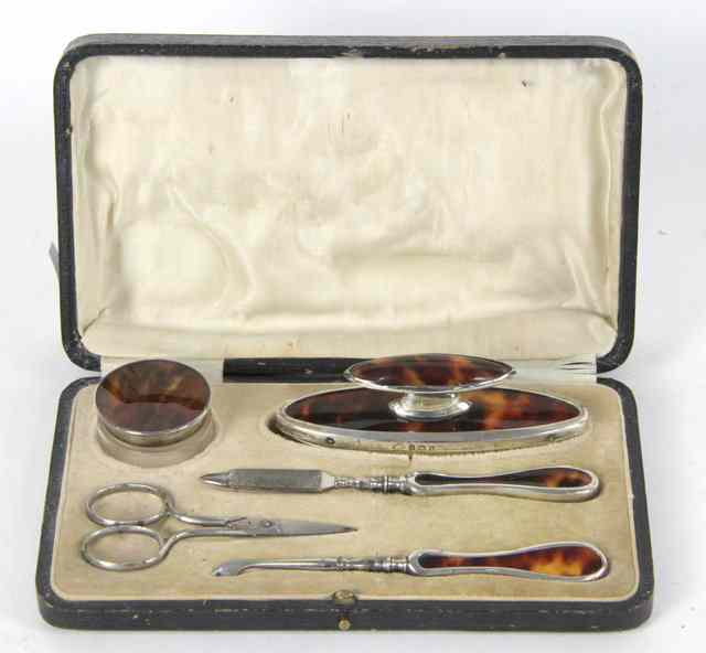 Appraisal: A silver and faux tortoiseshell manicure set Adie Brothers Birmingham