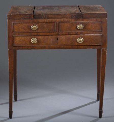 Appraisal: George III Dressing Table Walnut Opens to mirror with fitted