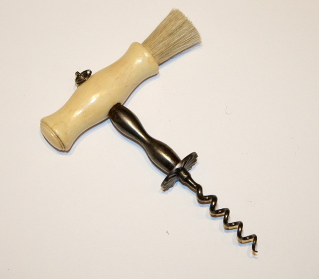 Appraisal: A STEEL AND BRUSHED TURNED BONE HANDLE CORKSCREW with a