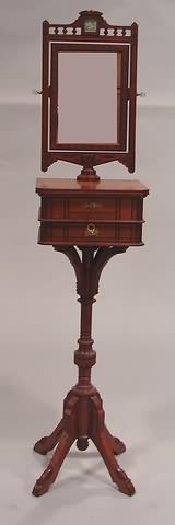 Appraisal: Walnut incised carved pedestal base supporting two-draws and a cheval