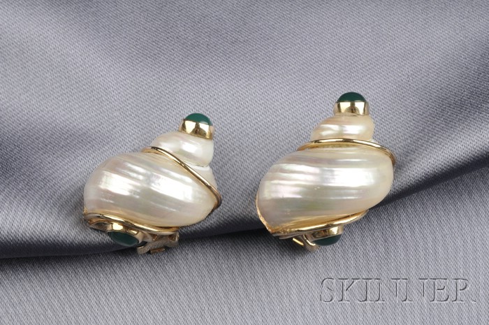 Appraisal: kt Gold and Turbo Shell Earclips Seaman Schepps each designed