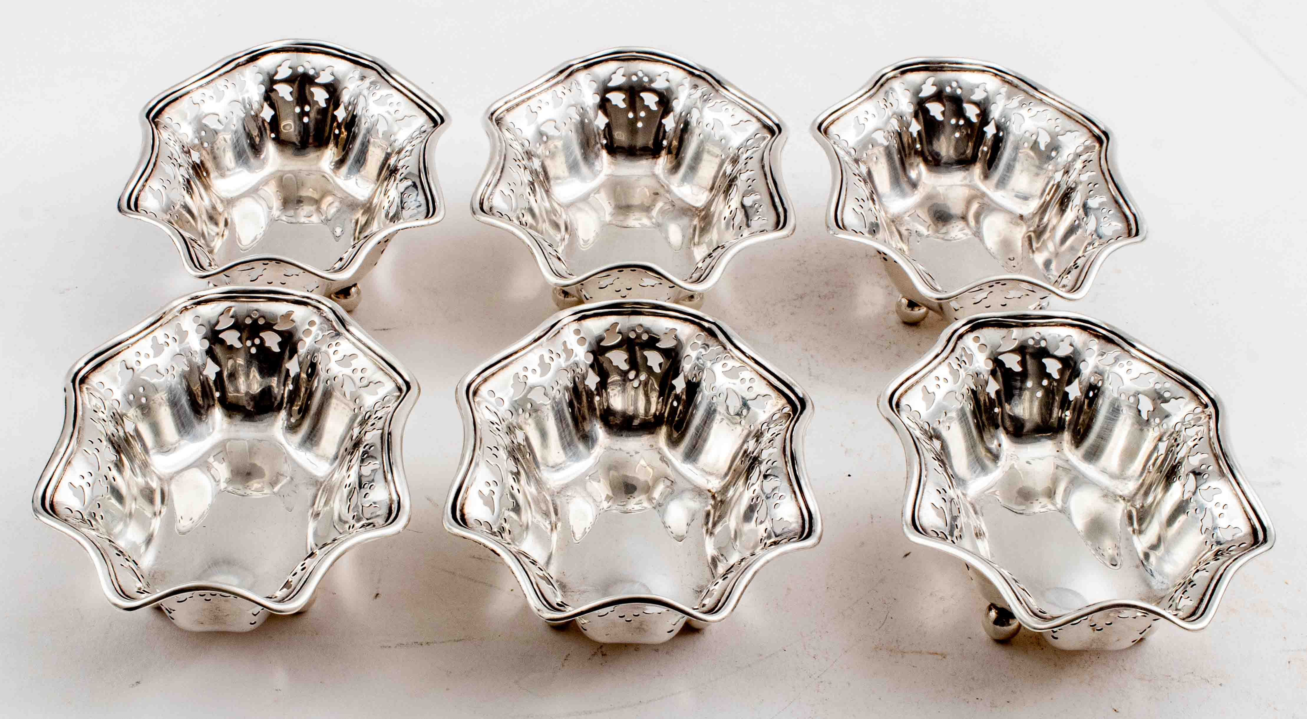 Appraisal: TIFFANY STERLING SILVER PIERCED FOOTED BOWLS Six Tiffany Co sterling