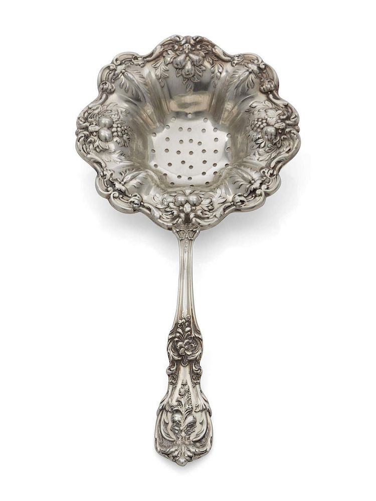 Appraisal: An American Silver Tea Strainer Length i An American Silver