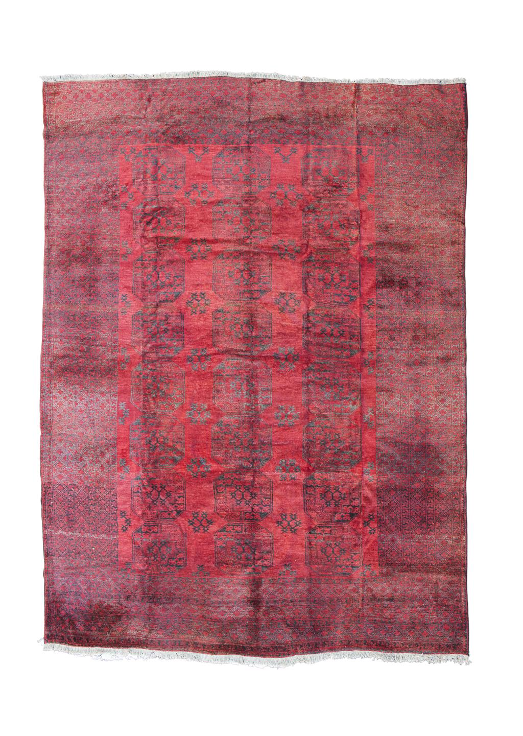 Appraisal: TURKOMAN CARPET TURKMENISTAN TH CENTURY the dark red field with