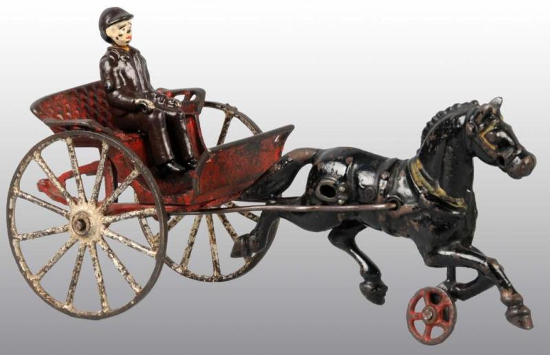 Appraisal: Cast Iron Dent Horse-Drawn Gig Toy Description Includes one reproduction