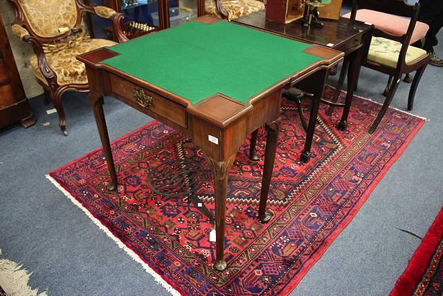 Appraisal: AN EARLY GEORGE III MAHOGANY TRIPLE FOLDOVER TEA CARD TABLE