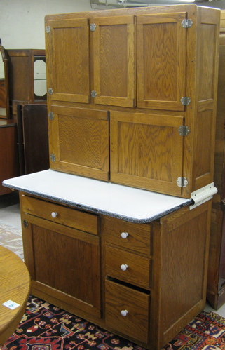 Appraisal: HOOSIER KITCHEN CABINET American early th century in two sections