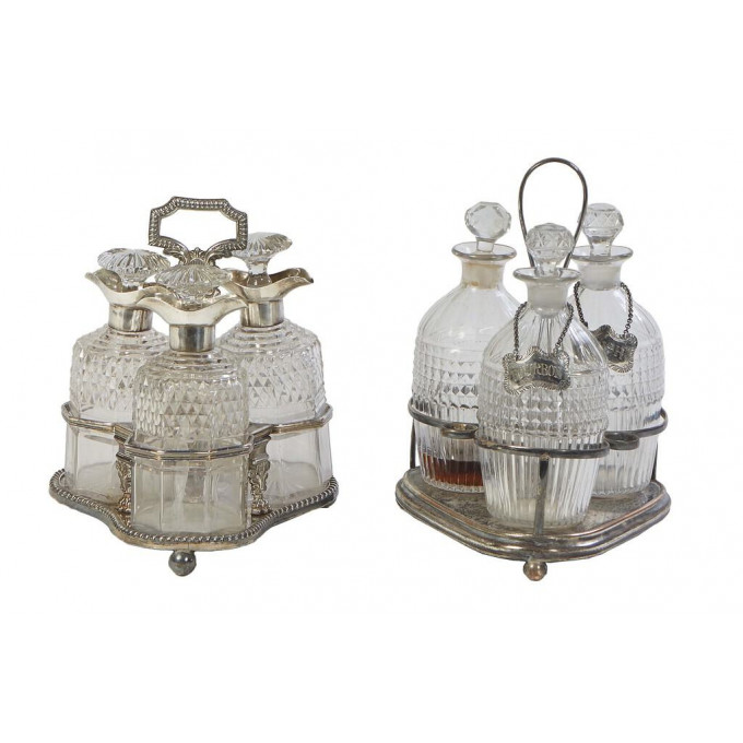 Appraisal: Two Silverplated Three Bottle Cruet Sets th c one with