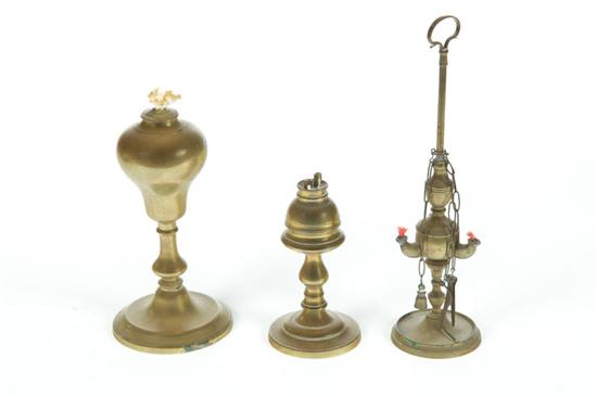 Appraisal: THREE BRASS LAMPS American or European th century Whale oil