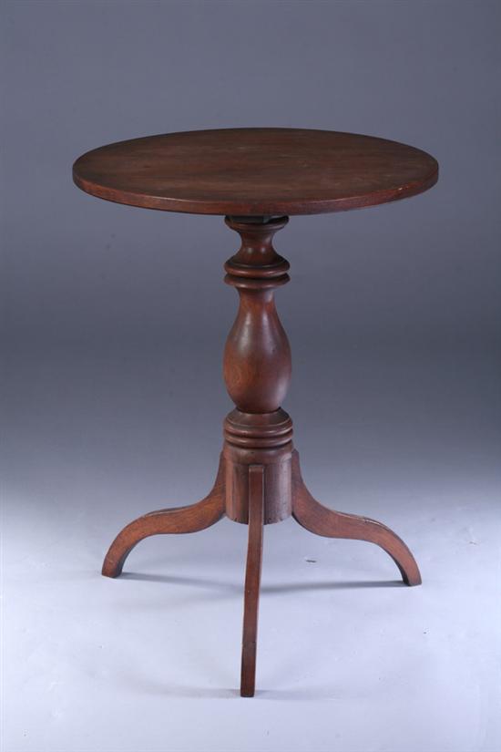 Appraisal: AMERICAN WALNUT SPIDER-LEG TABLE early th century Ring-turned baluster pedestal