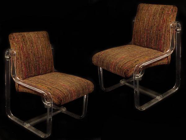 Appraisal: A set of four upholstered lucite armchairs and another lucite