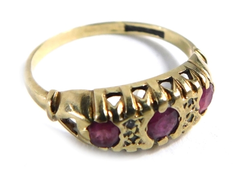 Appraisal: A ct gold gypsy ring set with three rubies in