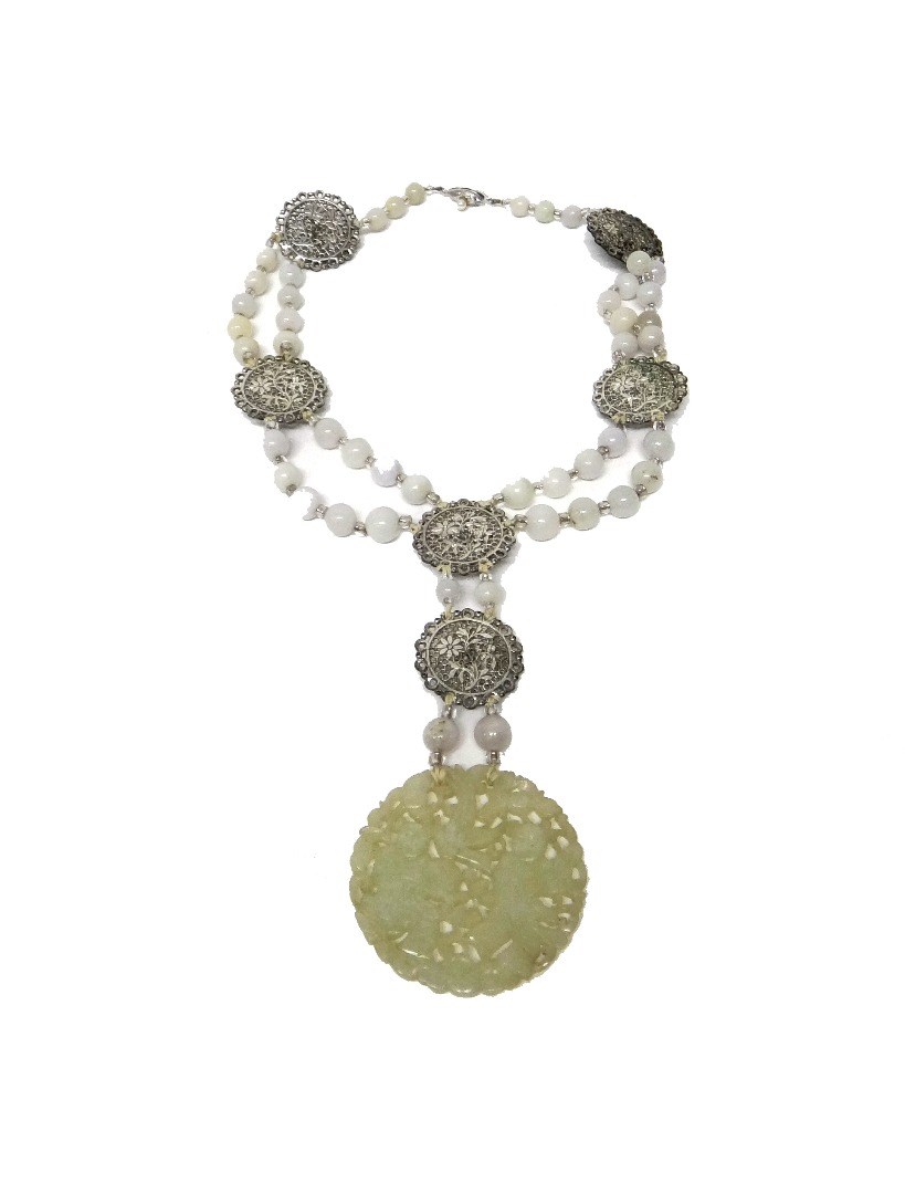 Appraisal: A Chinese jade necklace the front with a shaped circular