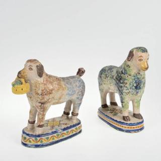 Appraisal: Continental sponge decorated faience sheep and dog th c pcs