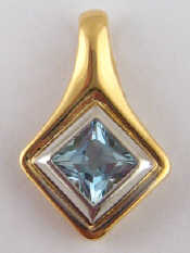 Appraisal: A yellow metal tests carat gold blue topaz pendant topaz