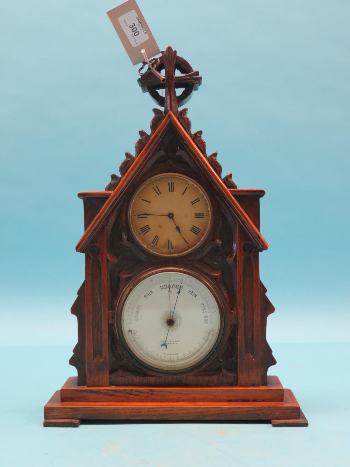 Appraisal: A Victorian gothic revival mantel clock-barometer timepiece movement aneroid barometer